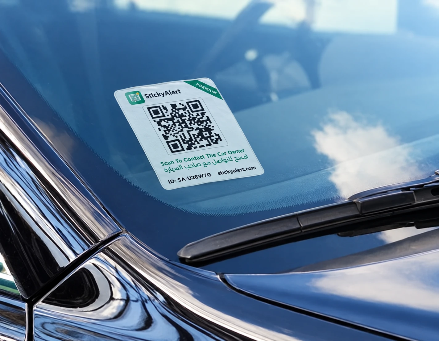 StickyAlert premium QR sticker on a car windshield
